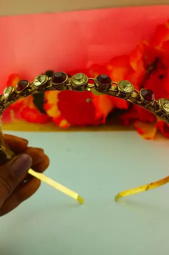 Stone stud gold plated  hair band color golden material brass  size free size