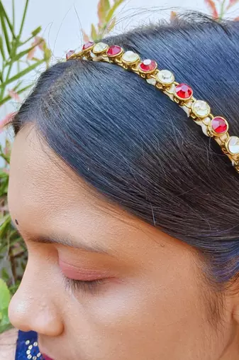 Stone stud gold plated  hair band color golden material brass  size free size