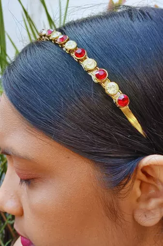 Stone stud gold plated  hair band color golden material brass  size free size