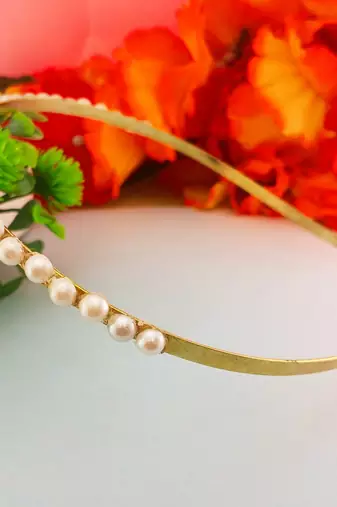 Stone stud gold plated  hair band color golden material brass  size free size