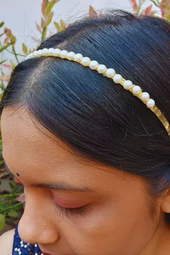 Stone stud gold plated  hair band color golden material brass  size free size