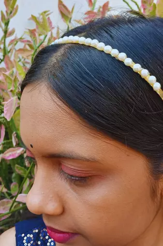 Stone stud gold plated  hair band color golden material brass  size free size