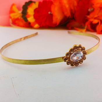 Stone stud gold plated  hair band color golden material brass  size free size 1