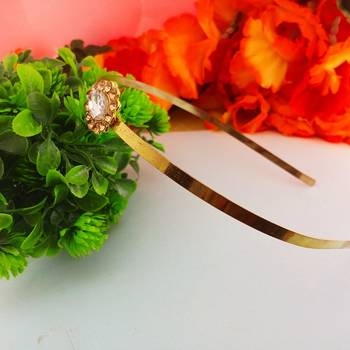 Stone stud gold plated  hair band color golden material brass  size free size 2