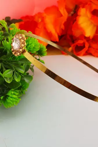 Stone stud gold plated  hair band color golden material brass  size free size