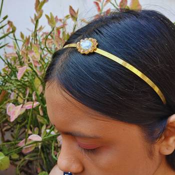 Stone stud gold plated  hair band color golden material brass  size free size 3