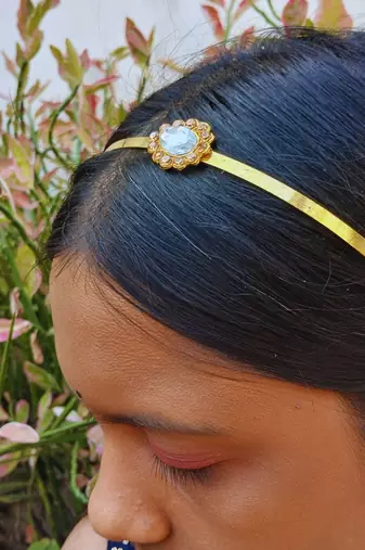 Stone stud gold plated  hair band color golden material brass  size free size