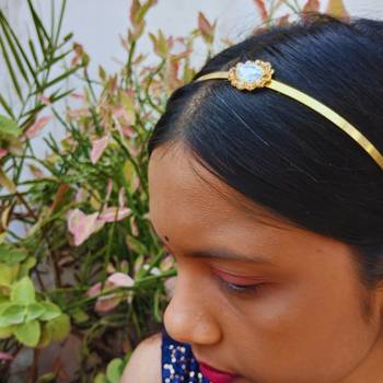 Stone stud gold plated  hair band color golden material brass  size free size 4