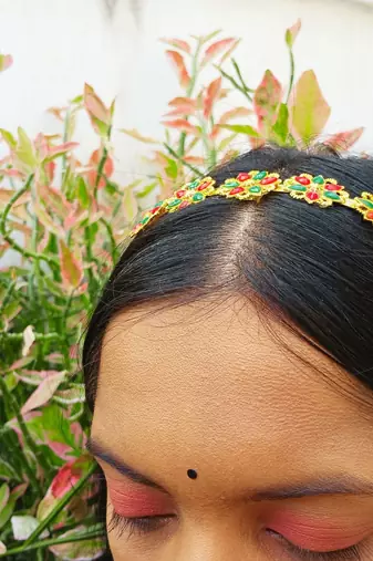 Stone stud gold plated  hair band color golden material brass  size free size