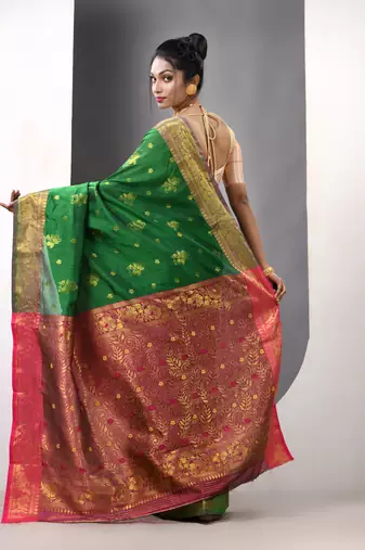 Green floral motifs silk saree with zari borders