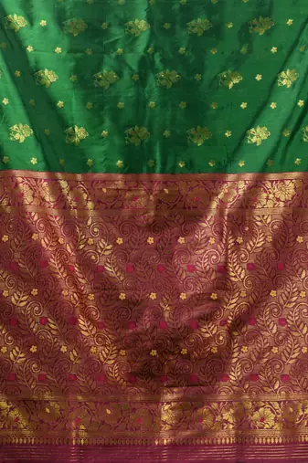 Green floral motifs silk saree with zari borders