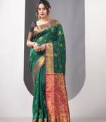 Green floral motifs silk saree with zari borders