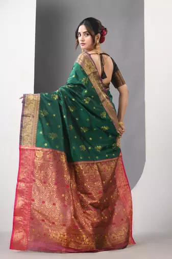Green floral motifs silk saree with zari borders