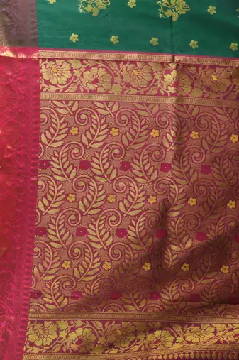 Green floral motifs silk saree with zari borders