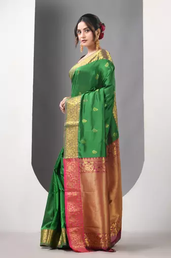 Green floral motifs silk saree with zari borders