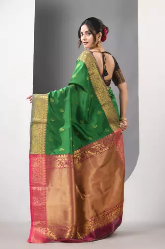Green floral motifs silk saree with zari borders