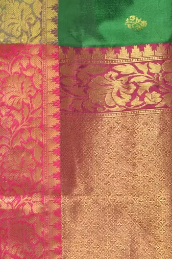 Green floral motifs silk saree with zari borders