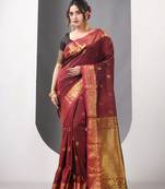 Maroon floral motifs silk saree with zari borders