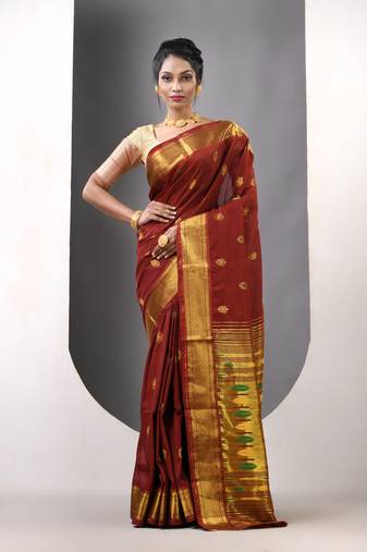 Brown ethnic motifs paithani silk saree with zari borders