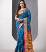 Sapphire blue ethnic motifs paithani silk saree with zari borders