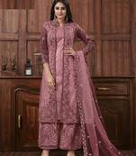 Purple net heavy embroidery semi stitched wedding suit