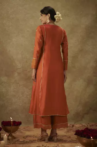 Yura orange hand woven chanderi slik a-line suit set with zardozi embrodiery