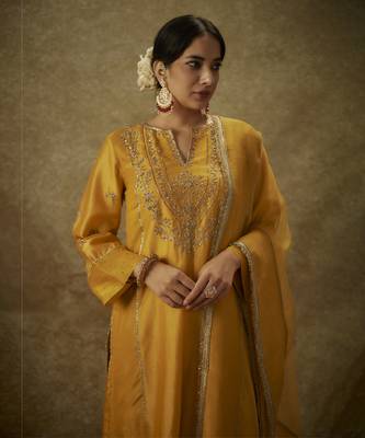 Anabia yellow hand woven chanderi slik suit set with zardozi embrodiery. 1