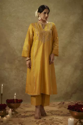 Anabia yellow hand woven chanderi slik suit set with zardozi embrodiery.