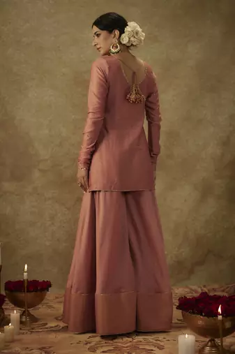 Erva blush pink hand woven chanderi slik sharara set with zardozi embrodiery.