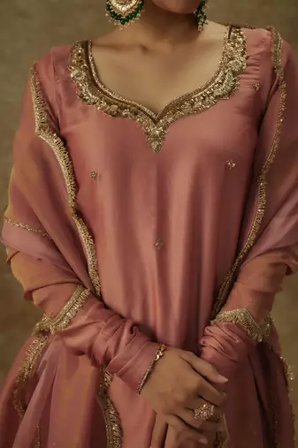 Erva blush pink hand woven chanderi slik sharara set with zardozi embrodiery.