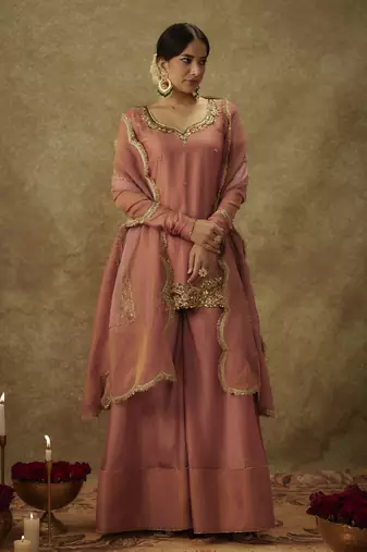 Erva blush pink hand woven chanderi slik sharara set with zardozi embrodiery.