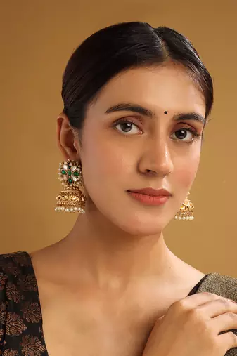 Gold-plated green kundan jhumkas with pearls work – perfect for any occasion