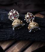 Gold-plated red kundan jhumkas with pearls work – perfect for any occasion