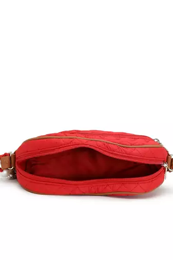 red tan polyester sling bag with chevron quilting