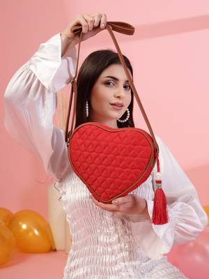 red tan polyester sling bag with chevron quilting 9