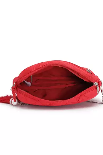red polyester sling bag with diamond quilting