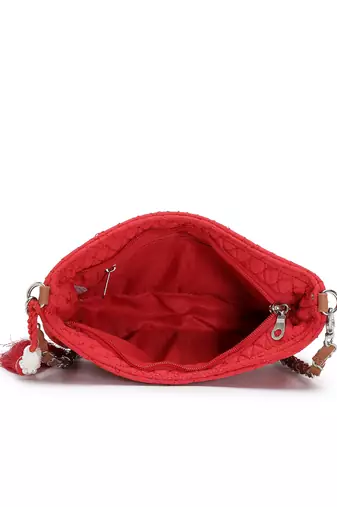 red tan polyester vegan leather sling bag