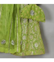 Green off shoulder organza frill chanderi lehnga set