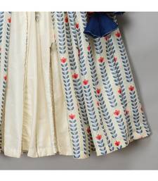 Off white printed off shoulder ruffled blouse lehnga set