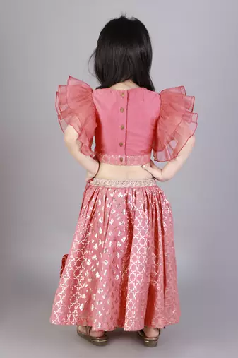 Coral pink ruffled blouse with cotton zari lehnga