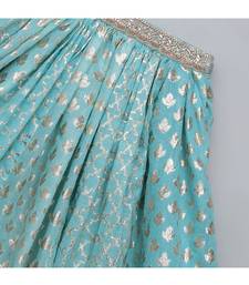 Blue ruffled blouse with cotton zari lehnga