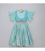 Blue ruffled blouse with cotton zari lehnga