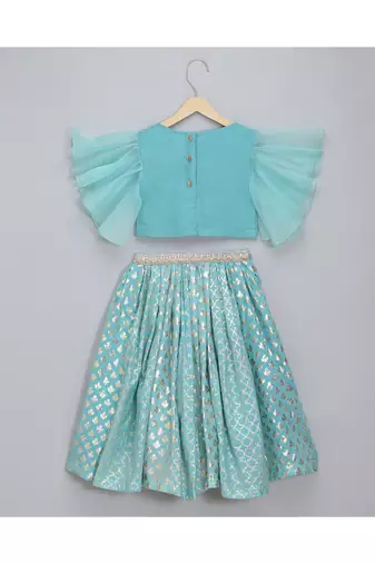 Blue ruffled blouse with cotton zari lehnga