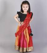 Black ruffled blouse with multi color lehnga