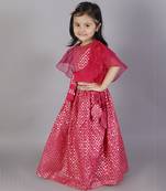 Fuschia pink ruffled blouse with cotton zari lehnga