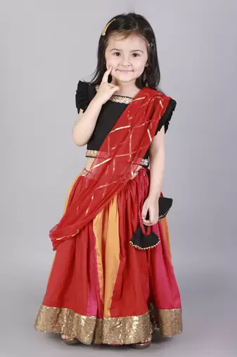 Black ruffled blouse with multi color lehnga