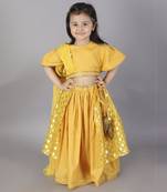 Mustard blouse with attached net dupatta and double layered lehnga