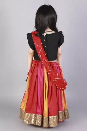 Black ruffled blouse with multi color lehnga