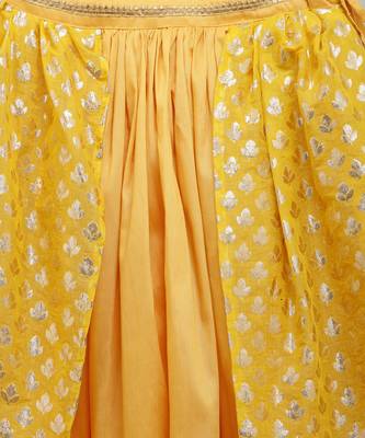 Mustard blouse with attached net dupatta and double layered lehnga 3