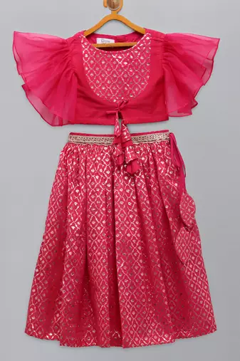 Fuschia pink ruffled blouse with cotton zari lehnga
